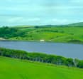 scottish borders loch with fields